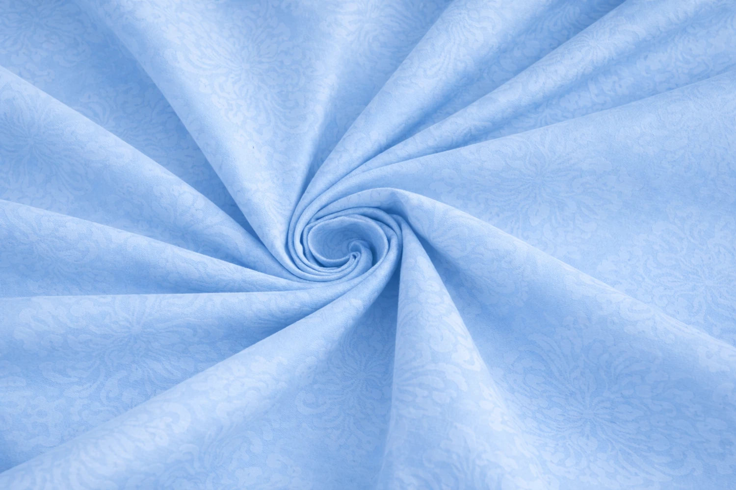 Close-up of ice blue embossed fabric texture – pure cotton fitted bed sheet with premium embossed swirl pattern for double bed by Homio