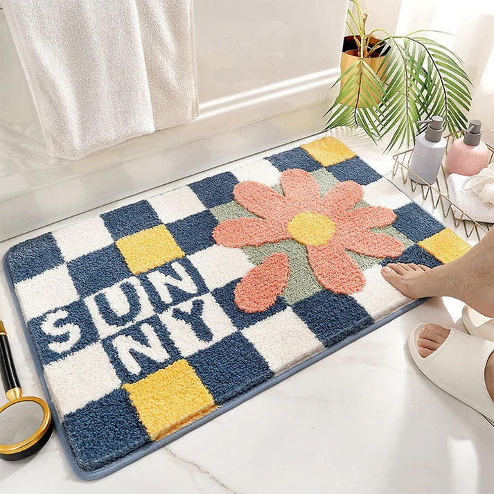 Sunny anti-slip microfiber door mat with floral design placed on bathroom floor