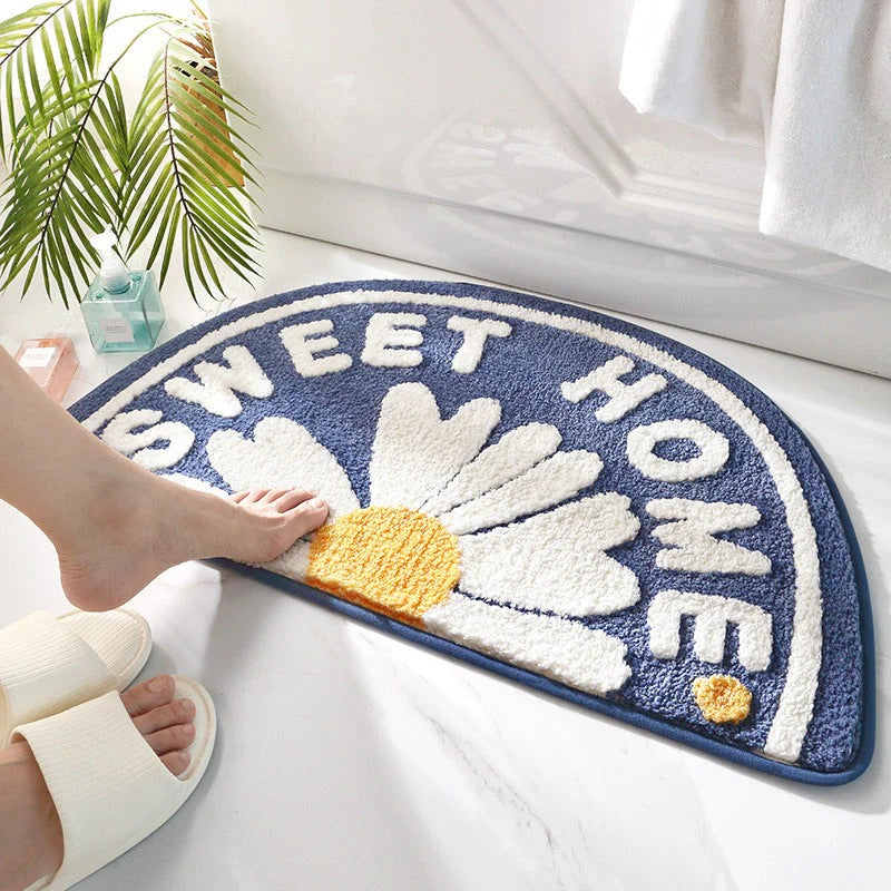 Casa microfiber door mat with “Sweet Home” text and floral design placed at home entrance