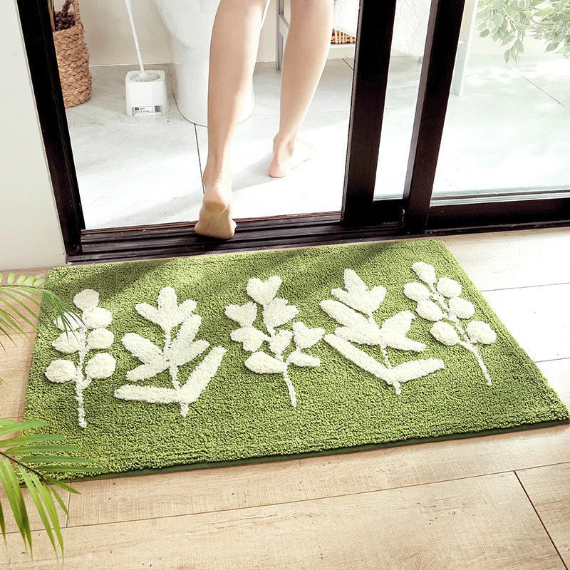 Pinegrove green leaf design microfiber door mat placed at home doorway