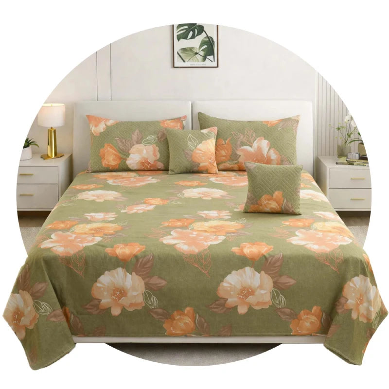 Green orange floral bedding set with pillow covers on double bed | Homio
